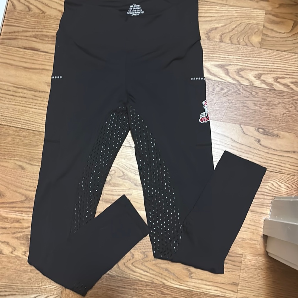 NWOT. The ManeRange women’s black leggings. Size L